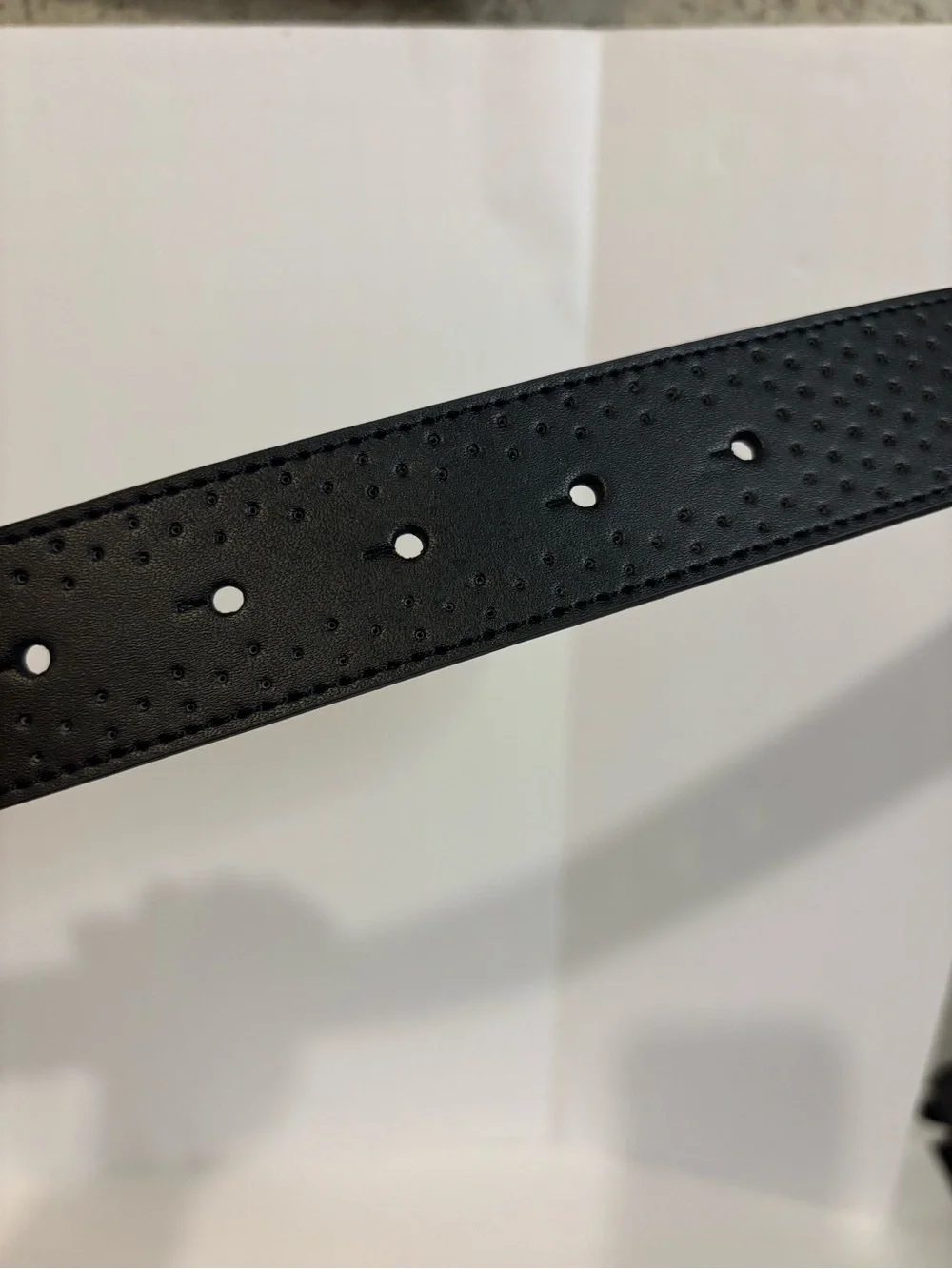 Nike Black Perforated Belt with Silver Oval Buckle